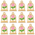 Macro view of 12 pieces vintage alloy rose pendants in glass bell jar style for DIY jewelry - Pink