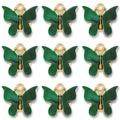 Detailed view of nine dark green butterfly pendants with golden frames in a grid layout - Green