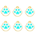 Detail of six blue and white enamel cat paw pendants with gold metal hanging loops - Blue