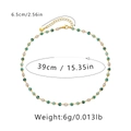 Detail of 18K gold-plated necklace with green crystal beads and adjustable lobster clasp - 18K Gold / Green Gold Beaded Style (KN0009)