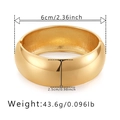Detail view of gold polished drum cuff bracelet with 6cm diameter and 2.5cm width specs - Gold Wide Polished Style (SZ60545-1)