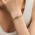 Elegant silver rhodium bracelet featuring white zircons and two yellow square crystals - Yellow Square Diamond Center Style (KB0545) / 18K Gold