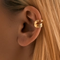 Detail of gold lava texture ear cuff with zircon accents worn on ear without piercing - Lava Bark Texture Style (KE1213)
