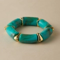 Close-up of turquoise resin beads with marble pattern and polished gold metal spacers - Turquoise Marble (AB0006-5)