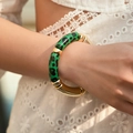 Macro shot of green leopard print and golden tube beads on a bohemian stretch bracelet - Glossy Leopard Style (AB0009-26) / Bright Green