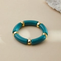 Macro shot of teal acrylic bamboo bangle featuring golden metal spacer beads - Deep Teal (AB0008-24)