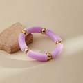 Close-up of lilac marble acrylic bangle with polished gold beads on beige stone surface - Light Purple Marble (AB0008-18)