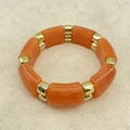 Detail of acrylic bamboo-style bracelet with orange marble beads and gold spacers - Warm Orange Barrel Resin Bead (AB0040-6)
