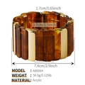 Vue détaillée du bracelet extensible en acrylique écaille et métal doré avec dimensions - Café Noir et Or