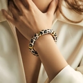 Detail of leopard print acrylic elastic bracelet with polished gold metal spacers - Beige Leopard (AB0008-7)