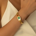 Bracciale rigido dorato aperto con turchese rosso e verde e intagli a triangolo - Decorazione a Goccia Bicolore Rosso Verde (SB0015)