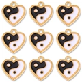 Macro view of nine heart-shaped Yin Yang enamel pendants for DIY jewelry making - Black