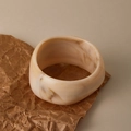 Minimalist wide acrylic bangle with cream and brown marble pattern on brown paper - Wide Bohemian Texture Style (AB0056-1)