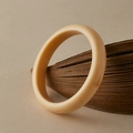Polished minimalist cream resin bangle with smooth glossy finish on a natural leaf base - Oily Gloss Ring Style (AB0052-2)