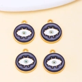 Detail of four blue evil eye alloy pendants with gold lashes for DIY jewelry making - Black