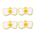 Close-up of four yellow and white alloy bow pendants with smiley face patterns - White