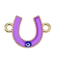 Detail of horseshoe-shaped purple enamel evil eye charm with gold beaded edges - Purple