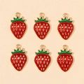 Detailed view of six red strawberry alloy charms with green leaves for DIY jewelry - Red Strawberry (px0865-11)