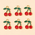 Detailed view of six red cherry charms with gold edges and green leaves for DIY jewelry - Cherry Shape (px0865-12)