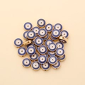 Macro shot of 10mm evil eye beads for DIY bracelets with detailed blue and gold patterns - Round Style (px0942-3)
