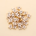Detail of star-shaped 10mm evil eye beads with golden alloy frame for DIY jewelry making - Star Shape (px0942-10)