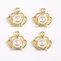 Detailed view of four gold crown pendants with white imitation pearls and rhinestones - Gold Pearl Crown Style A (px0912-3)