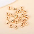 Détail de perles ovales en émail blanc et alliage doré pour la création de bijoux - O (px0918)