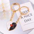 Detail of interlocking heart keychains for couples with gold-plated finish and reflections - Black White Stick Figure Style(px0959-5)
