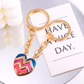 Detail of interlocking heart puzzle keychains with vibrant colorful enamel on gold finish - Purple Blue V-Shape Enamel Style(px0959-7)