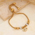 Bracciale a cuore in acciaio inossidabile dorato con strass su base di pietra naturale - Doppio cuore dorato