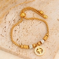 Pulsera ajustable de acero de titanio dorado con cadena de cuentas y colgante de cruz - Cruz Dorada