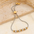 Bracciale a catena serpente regolabile placcato oro 18K con perline di cristallo - Quattro Diamanti Di Fango In Oro Bicolore