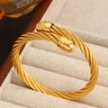 Brazalete rígido de cable trenzado en acero inoxidable dorado con puntas pulidas - Dorado