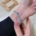 Sparkling zircon silver cuff bracelet for women with crystal inlay and elegant design - Steel