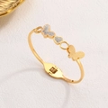 Double-layered butterfly and heart gold-plated stainless steel bangle with zircons - Gold