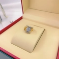 Detailed view of a multi-layer gold cross ring with micro-pave crystals in a red gift box - Gold 5#