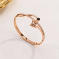 Rose gold titanium bangle featuring butterfly charm and sparkling zircon accents - Rose Gold