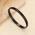 Gepolijste zwarte minimalistische roestvrijstalen armband met 18k goud vergulding - Bolle Stijl (6) / Zwart