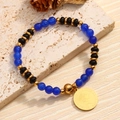 Bracelet extensible de 6mm en perles bleues et noires avec un pendentif pièce dorée - Style Pièce Élisabeth Bleu (09)