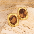 Boucles d'oreilles ovales ambrées rétro avec monture dorée sur un support en pierre - Style Oval Brun Foncé Texture Rayonnante (15)