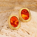 Boucles d'oreilles ovales rétro dorées avec résine ambre sur pierre de travertin - Style Oval Ambre Texture Rayonnante (14)