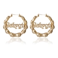 Gold bamboo hoop earrings with Babygirl lettering in a stylish hip hop street style - Round Babygirl / Gold