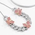 Close-up of sparkling silver Cuban chain with pink rhinestone butterfly charms detail - Silver Pink Rhinestone