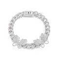 Macro shot of silver Cuban link anklet with iced-out butterfly charms and pavé diamonds - Silver Clear Rhinestone