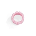 Macro detail of glossy pink resin ring featuring a trendy chunky wavy gear design - Pink