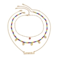 Drielaagse halsketting met kleurrijke kralen, hartbedeltjes en MUSCLE-letter hanger - Stijl 5 Goud (2277)