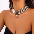 Gelaagde zilveren kralenketting met een onregelmatige metalen hanger voor dames - Zilver (X2203)