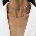 Chic layered gold necklace featuring a sleek snake chain and textured link chain on a model - Gold Splicing Chain Style (1570)