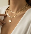 Triple layer gold chain necklace with snake link and coin pendant on a model - Gold Coin Layered Style (1803)