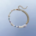 Collana di perle barocche con perline colorate e stelle dorate su specchio blu - Oro (3970) Stella Perla Barocca